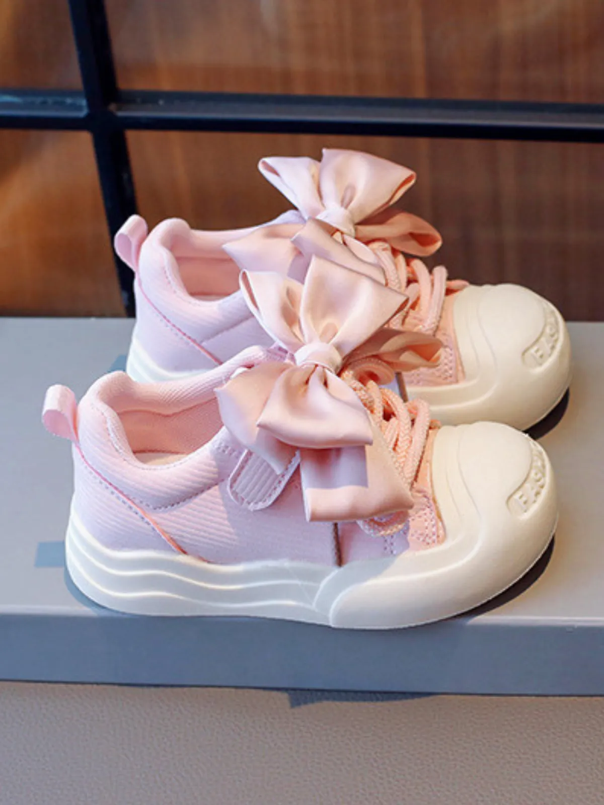 Tiny Toes, Big Dreams Satin Bow Sneakers By Liv and Mia